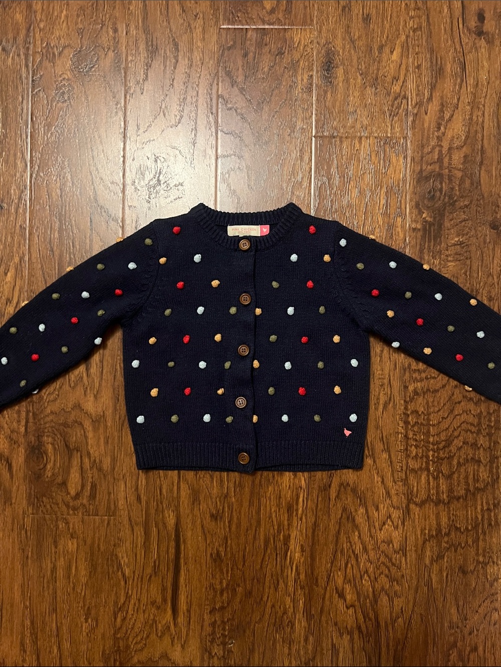 Pink chicken navy cardigan
